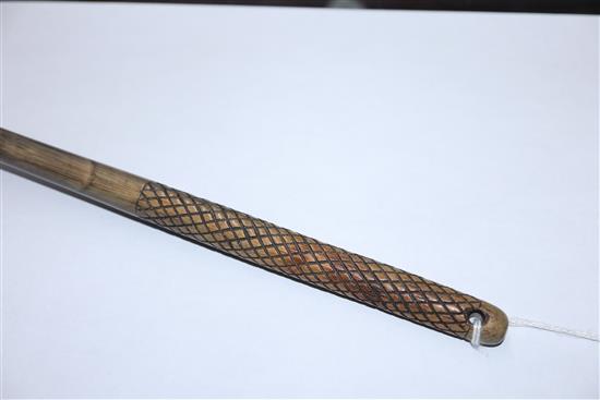 A South Asian rhinoceros horn gong beater